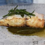 Lomo de corvina sobre cremoso de espinacas agus gastrobar en campoamor1