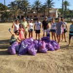 the canallas iniciativa recogida de basuras en la playa de campoamor