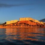 aguamarina, atardecer, colores anaranjados Dehesa de Campoamor